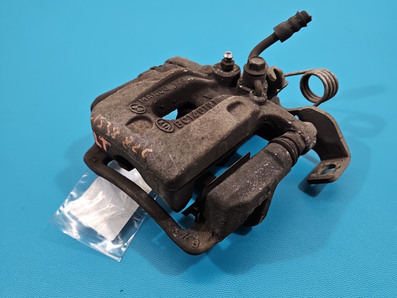 Zacisk tył lewy Hyundai Elantra VI 15-20 1.6 16V sedan