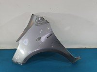 Błotnik przód lewy Toyota Yaris II srebrny 1F8