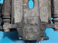 Zacisk przód lewy Toyota Prius II XW20 03- 1.5b (1NZ)