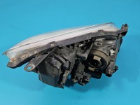 Reflektor lewy lampa przód Toyota Avensis II T25 EUROPA