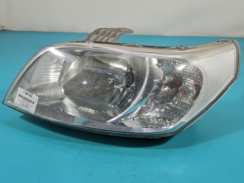 Reflektor lewy lampa przód Chevrolet Aveo T250 EUROPA