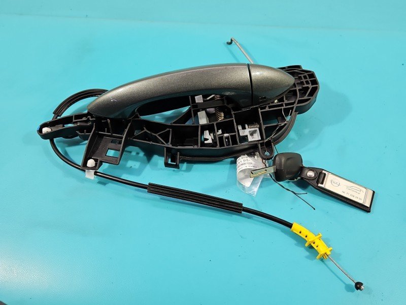 Klamka przód lewa zewnętrzna Opel Astra V K