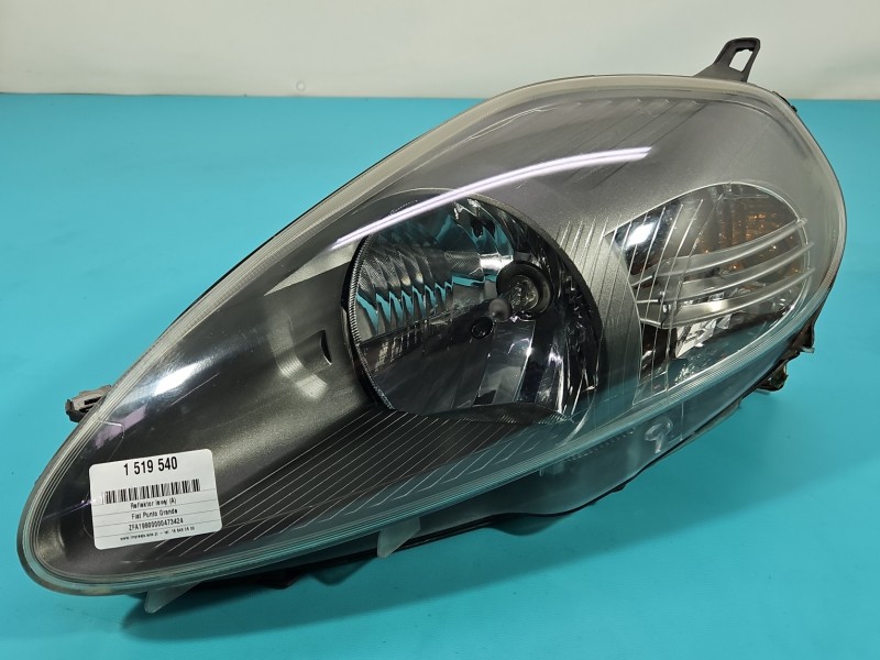 Reflektor lewy lampa przód Fiat Grande Punto EUROPA