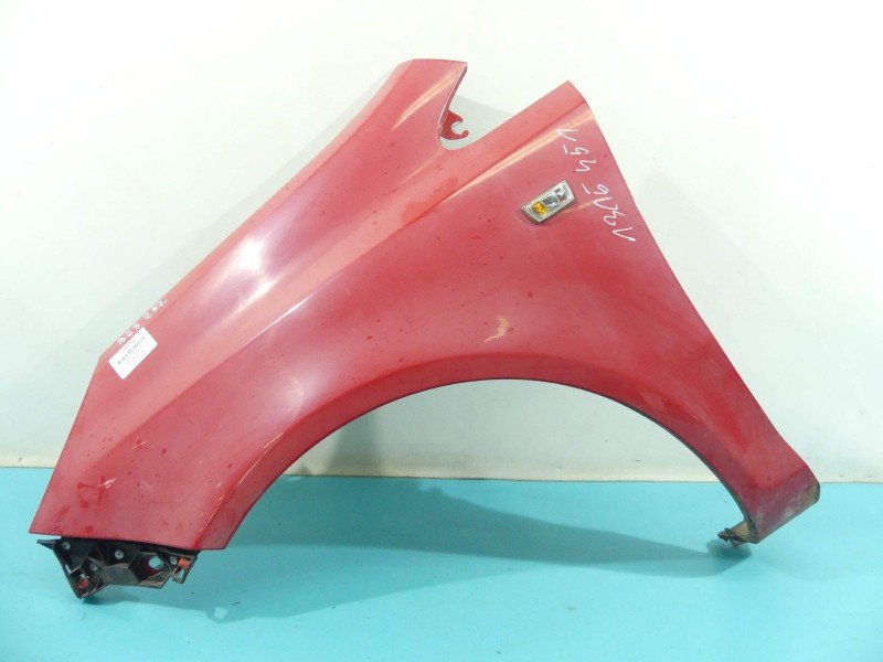 Błotnik przód lewy Opel Corsa D czerwony Y547