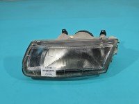 Reflektor lewy lampa przód Mitsubishi Carisma EUROPA