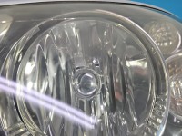 Reflektor lewy lampa przód Nissan Primera P12 EUROPA 1EJ238010-01