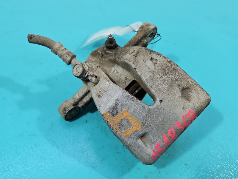 Zacisk tył lewy Toyota Avensis II T25 2.0 d4d kombi