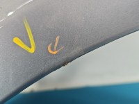 Błotnik przód lewy Fiat Grande Punto srebrny 595/A