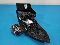 Lampa tył lewa Opel Astra V K kombi Pęknięte mocowanie trzymający wkład VALEO KOMBI W BŁOTNIK EUROPA