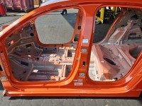 Próg lewy SŁUPEK ŚRODKOWY B Opel Corsa F HB 5d pomarańczowy KVH