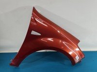 Błotnik przód prawy Dacia Sandero I 08-12 bordowy TEB76