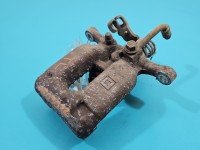 Zacisk tył lewy Opel Astra V K 1.5 cdti HB