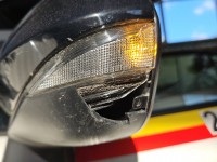 Lusterko lewe Toyota Corolla E21 19- elektryczny, Europejska, Kod lakieru: 040, El. Składane, pęknięta obudowa i uszkodzone...