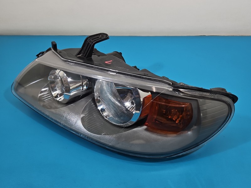 Reflektor lewy lampa przód Nissan Almera N16 EUROPA