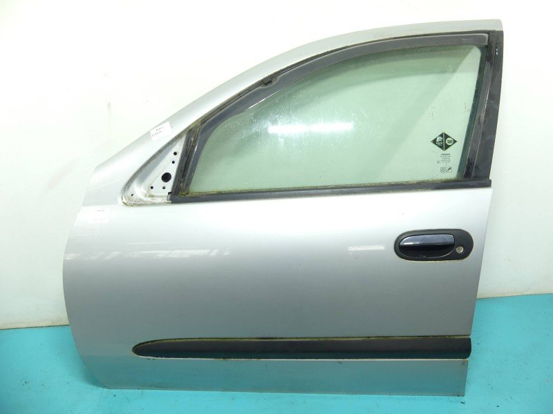 Drzwi przód lewe Nissan Almera N16 5d srebrny KL0