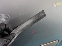 Drzwi tył lewe Nissan Almera N16 HB 5d srebrny