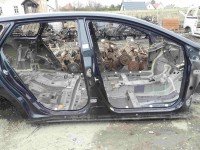Próg prawy SŁUPEK ŚRODKOWY B Toyota Avensis III T27 kombi 5d czarny 1H2