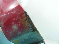 Błotnik przód lewy Opel Corsa D czerwony Y547