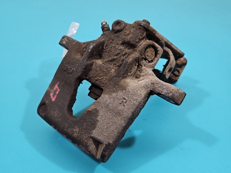 Zacisk tył lewy Opel Movano I 2.8 TD HB