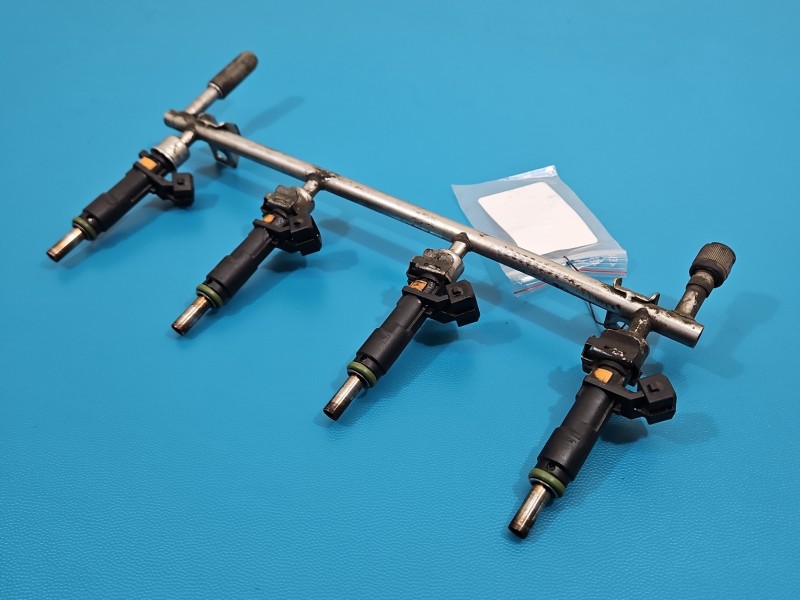 Wtryskiwacz Opel Zafira B 55353806 1.8 16V