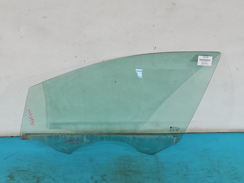 Szyba drzwi przód lewa Opel Astra V K kombi
