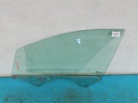 Szyba drzwi przód lewa Opel Astra V K kombi