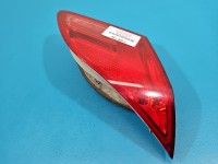 Lampa tył lewa Producent części: OPEL, 09-12 Z KLAPY BAGAŻNIKA Z LISTWĄ ŻARÓWKOWĄ hatchback Opel Astra IV J HB