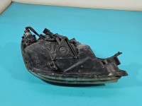 Reflektor lewy lampa przód Mitsubishi Lancer VII EUROPA