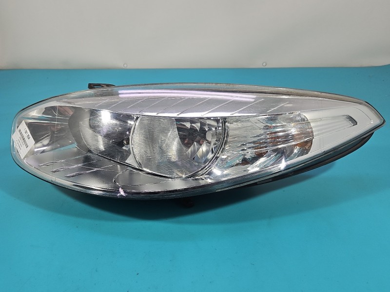 Reflektor lewy lampa przód Renault Fluence EUROPA 260600078R
