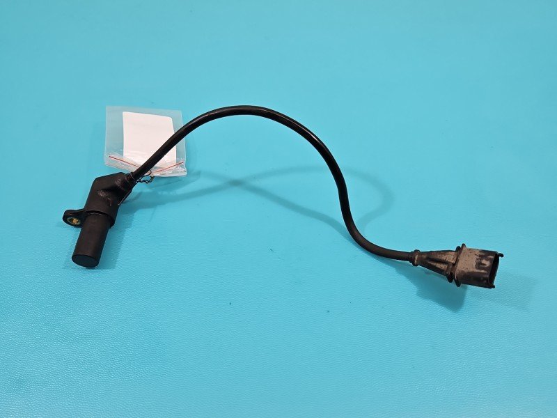 Czujnik położenia wału korbowego Opel Zafira A 90520856
