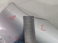 Błotnik przód prawy Toyota Yaris I srebrny 1E7