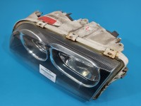 Reflektor lewy lampa przód Volvo V40 S40 I EUROPA 1AG247002-01, 30899878