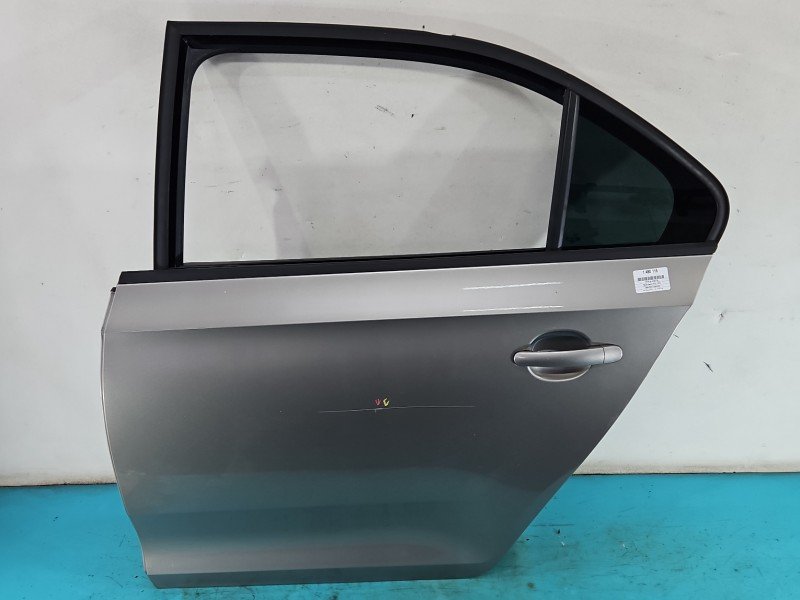 Drzwi tył lewe Skoda Rapid HB 5d beżowy LF8H