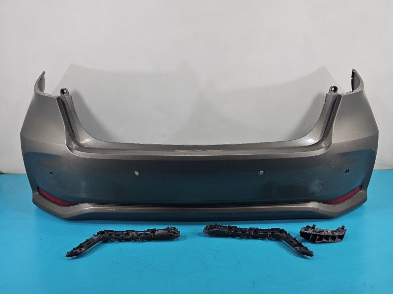 Zderzak tył Toyota Corolla E21 19- beżowy 6x1 sedan