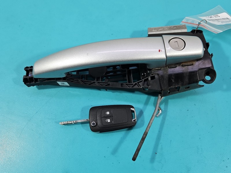 Klamka przód lewa zewnętrzna Opel Corsa E 13346228