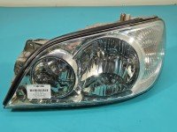 Reflektor lewy lampa przód Kia Carnival I EUROPA