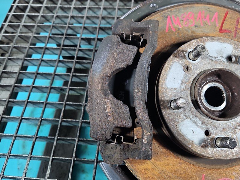 Zacisk przód lewy Honda Civic VIII UFO 1.8 16V (R18A2)