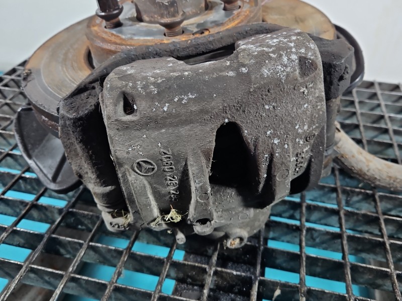 Zacisk przód lewy Mercedes W211 2.2 cdi