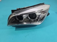 Reflektor lewy lampa przód BMW X1 E84 EUROPA 90018090, 7290239