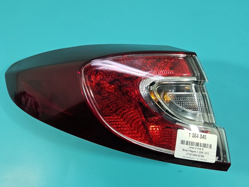 Lampa tył lewa Renault Megane III kombi KOMBI / W BŁOTNIK / Z LISTWĄ ŻARÓWKOWĄ EUROPA