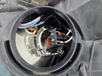 Reflektor lewy lampa przód Renault Megane III EUROPA 260600017R