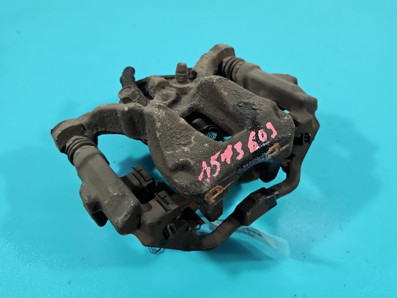 Zacisk tył prawy Toyota Corolla E21 19- 1.8 16V sedan