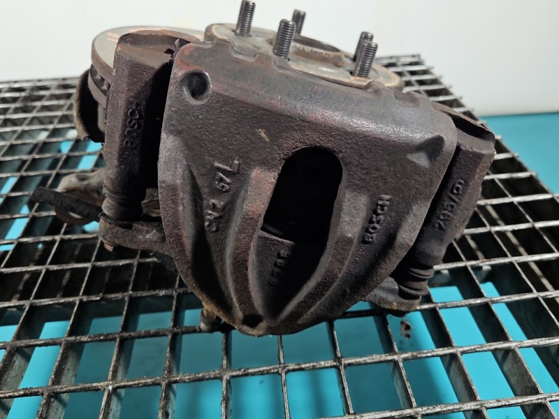 Zacisk przód lewy Toyota Avensis II T25 2.0 D4D