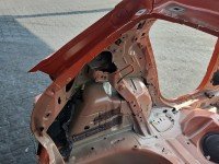Błotnik tył lewy Opel Corsa F ćwiartka pomarańczowy KVH