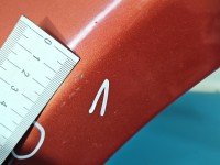 Błotnik przód lewy Dacia Sandero I 08-12 bordowy TEB76