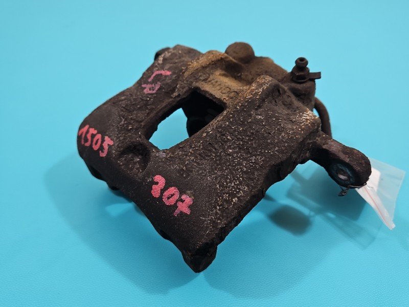 Zacisk przód lewy Hyundai I20 I 08-14 1.4 16V (G4FA)