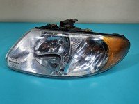 Reflektor lewy lampa przód Dodge Caravan IV 00-07 EUROPA