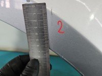 Błotnik przód prawy Kia Carnival II 05-14 srebrny