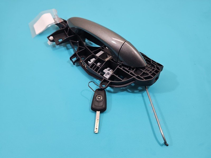 Klamka przód lewa zewnętrzna Opel Astra V K 13515507