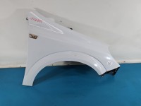 Błotnik przód prawy Opel Astra III H biały Y474